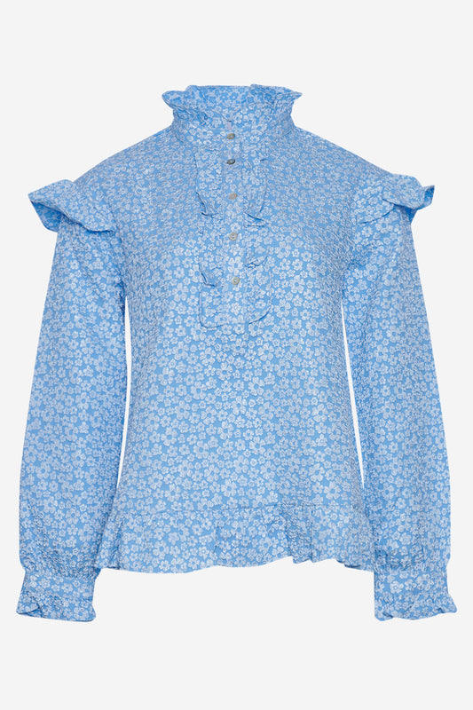 Noellas Reno Ruby Ruffle Blouse Light Blue. Køb Bluser hos www.noellafashion.dk